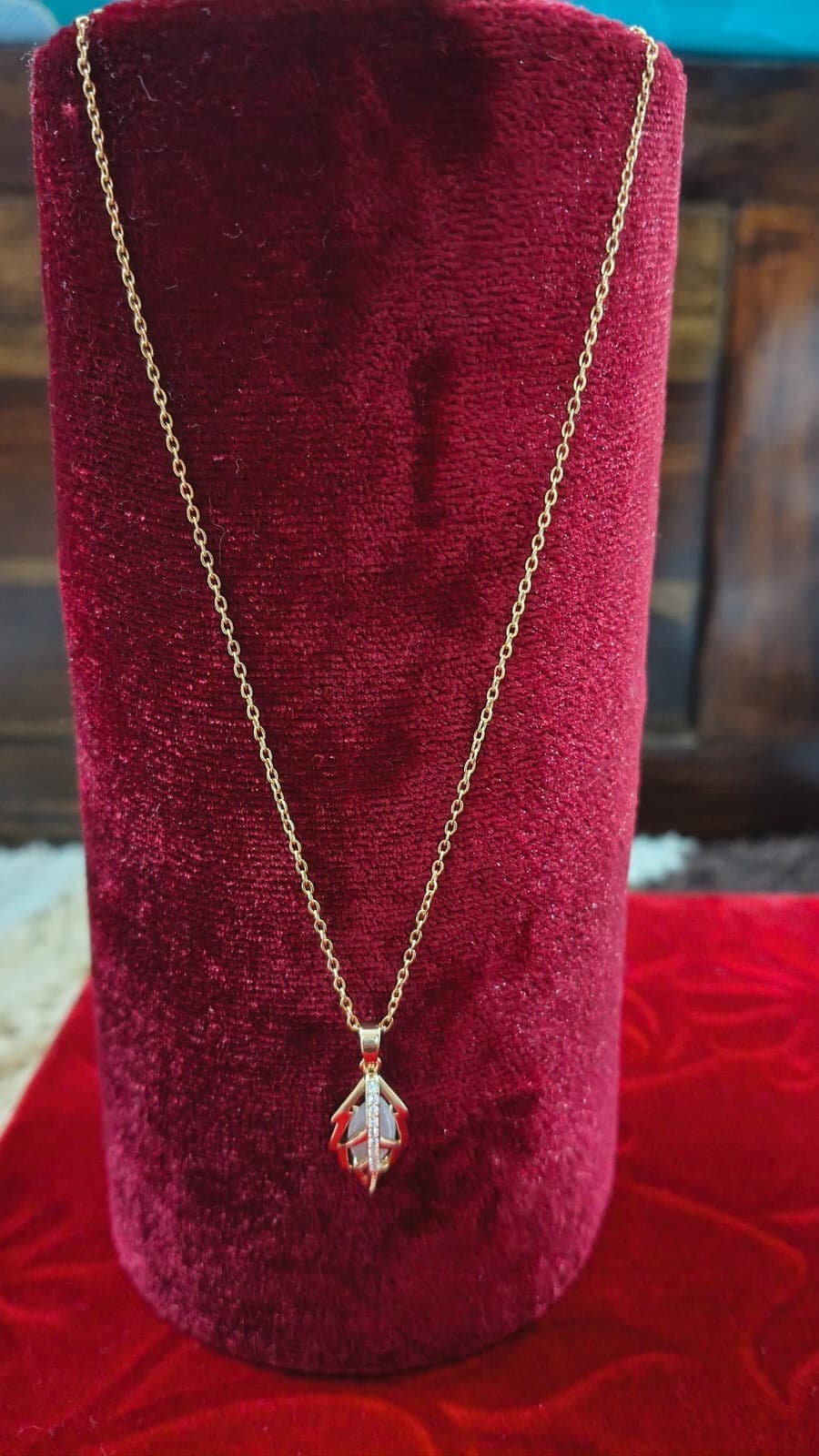 Leaf Cage Stone Pendant